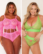Two women wearing pink and green lace lingerie sets on a plain background