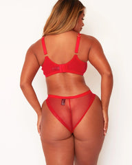 Red Lingerie set worn by a model on a white background