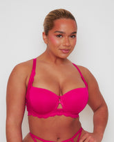 Front view of the Daley T-Shirt Bra and Portia Thong in Very Cherry, featuring smooth moulded cups, delicate floral lace accents, and a feminine centre-front keyhole detail. The matching strappy lace thong adds a bold and flattering finish.