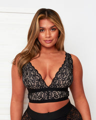 Front view of the Tutti Rouge Eden Midnight Black longline bralette with floral lace, wide lace straps and a plunging neckline.