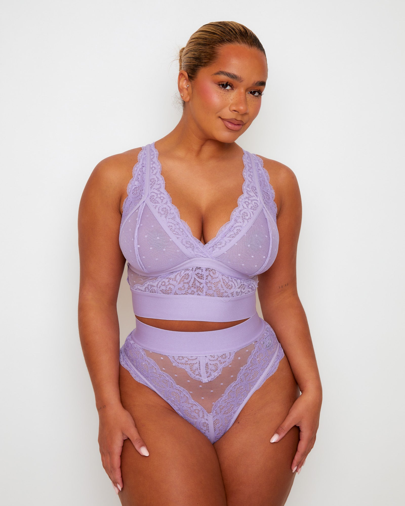 Tutti Rouge Francine Soft Lavender bralette and thong set, front view showing a lace-trimmed plunge neckline and high-waisted dotted mesh thong.