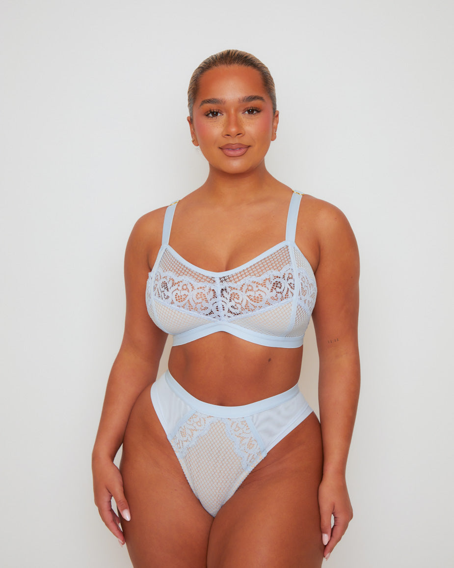Front view of the Tutti Rouge Frankie Bralette in Ballad Blue paired with the matching Frankie Brazilian Brief, featuring soft floral lace, breathable mesh and a comfortable, wire-free silhouette.