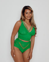 Close-up of a Harlequin Green lace bralette featuring scalloped lace cups, supportive wide underband, and elegant strappy neckline detail for fuller bust support.