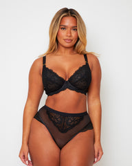 Front view of the Tutti Rouge Harlow Fuller Bust Bra and High Waist Brief Set in Midnight Black featuring supportive underwired lace cups, sheer mesh and elegant floral lace detailing.