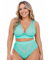 Front view of a model wearing the Tutti Rouge Hallie Bralette and Francine Thong in Ocean Wave, a supportive fuller bust lingerie set featuring soft mint floral lace, sheer mesh panels and a flattering high-waisted thong.
