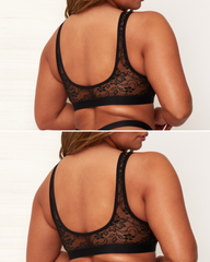 Black lace bra worn by a model on a plain background