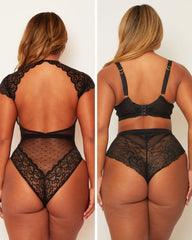 Black lace lingerie set on a plain background