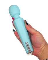 Light blue personal massager adult toy held by a hand with black nail polish on a white background
