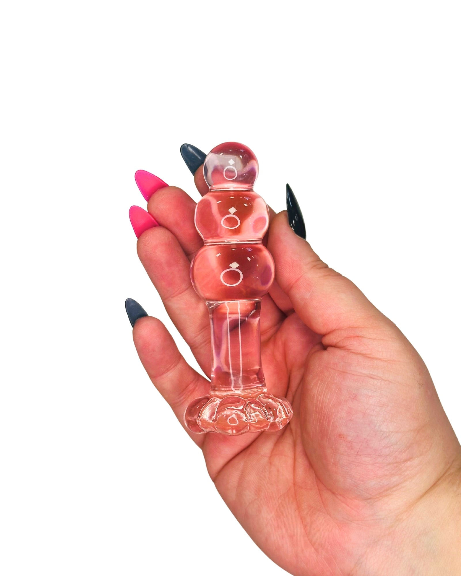 Brand X by Tutti toys pink glass sex toys - showing scale of the 3-stage Flower Power beaded glass plug.