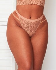 Front close-up of the Tutti Rouge Aria Warm Sand lace thong, featuring a wide waistband and slim side straps.
