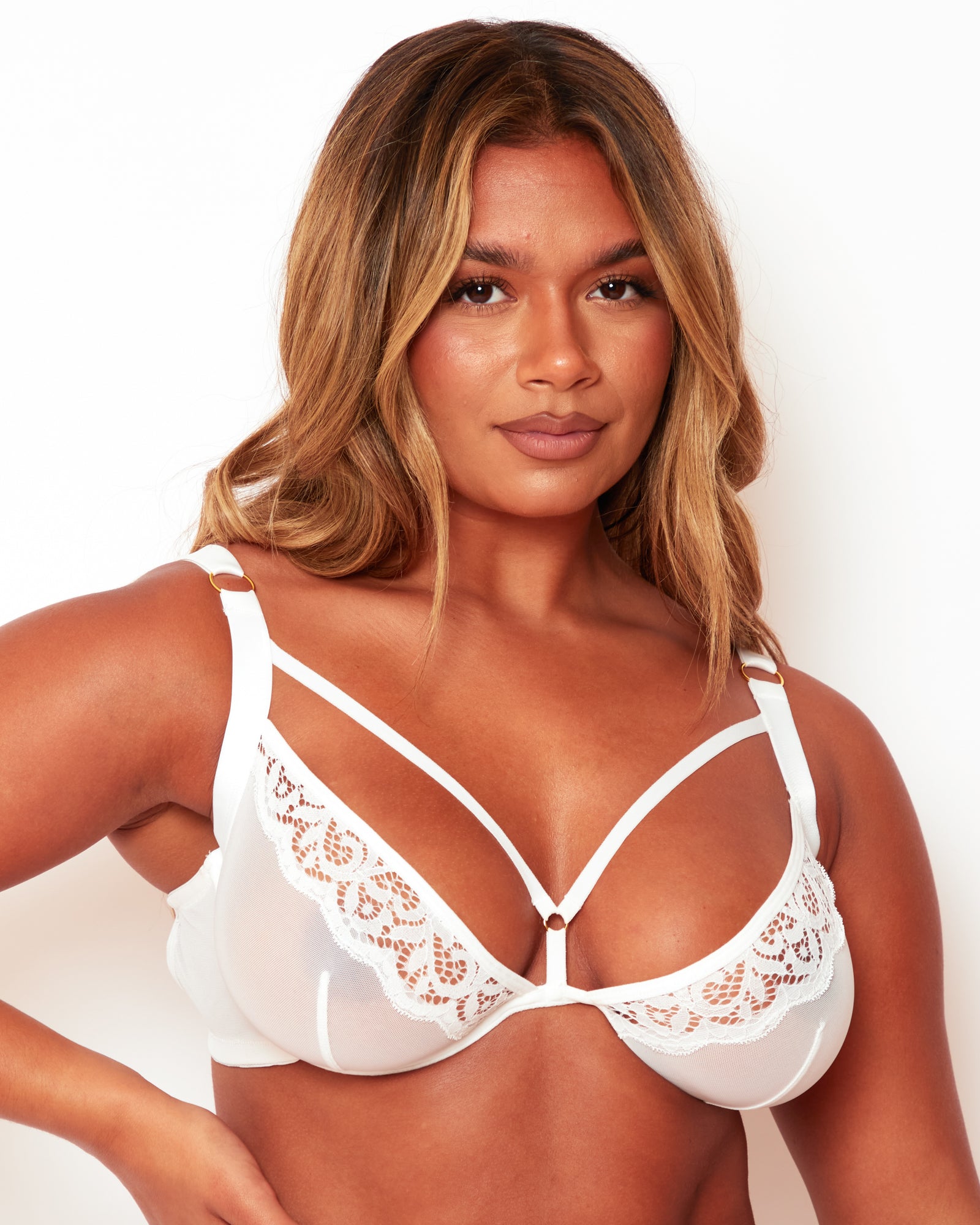 Close-up of Tutti Rouge Artemis white underwired plunge bra with lace-trimmed cups and strappy neckline.