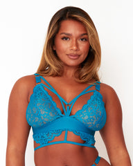 Front close-up of the Tutti Rouge Brooklyn Deep Water blue lace bralette with a strappy plunge neckline and cut-out longline underband.
