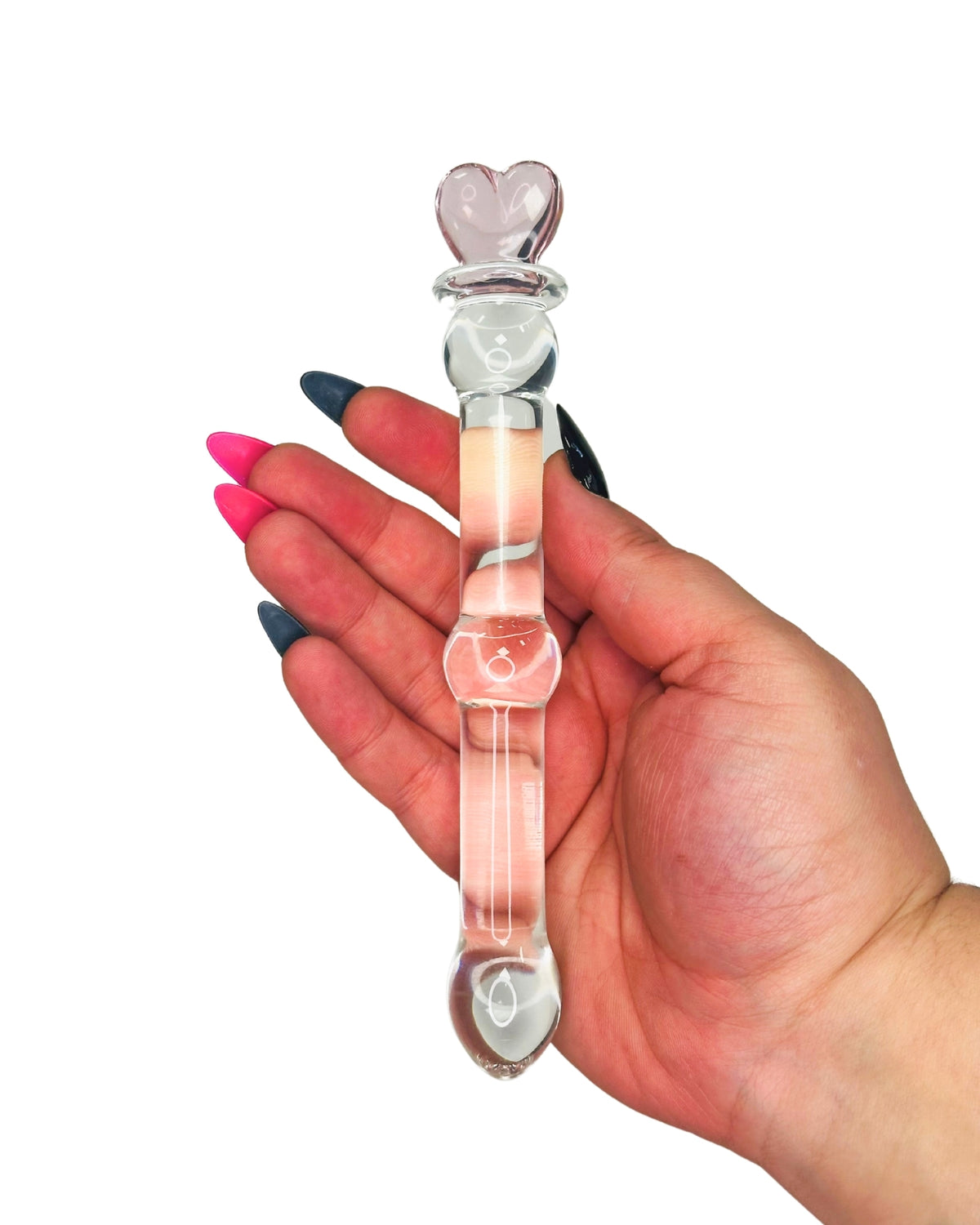 Brand X toys Capture MY Heart clear glass dildo shown for scale in hand to demonstrate length and size