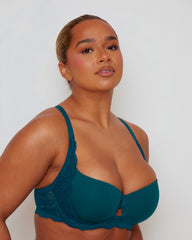 Front view of the Daley Lace T-Shirt Bra in Blue Coral, featuring smooth moulded cups, delicate floral lace detailing, and a subtle keyhole accent at the centre front. The matching lace thong completes the elegant everyday lingerie set.