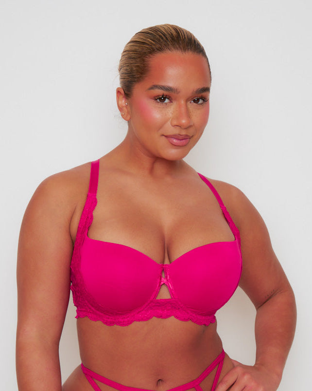 Front view of the Daley T-Shirt Bra and Portia Thong in Very Cherry, featuring smooth moulded cups, delicate floral lace accents, and a feminine centre-front keyhole detail. The matching strappy lace thong adds a bold and flattering finish.