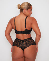 Rear view of Tutti Rouge Daley bra in Midnight Black, showing lace back and gold heart strap adjusters, worn with lace briefs.