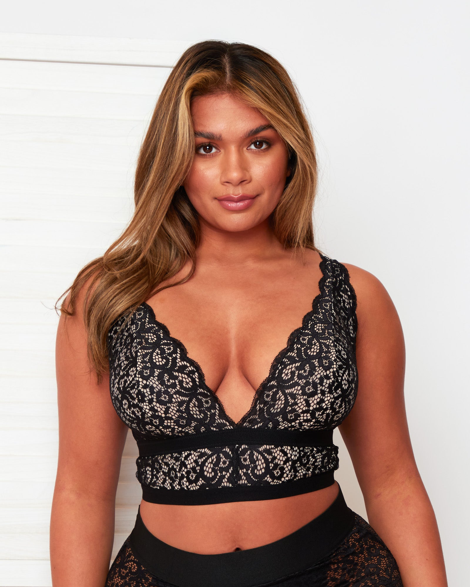 Front view of the Tutti Rouge Eden Midnight Black longline bralette with floral lace, wide lace straps and a plunging neckline.