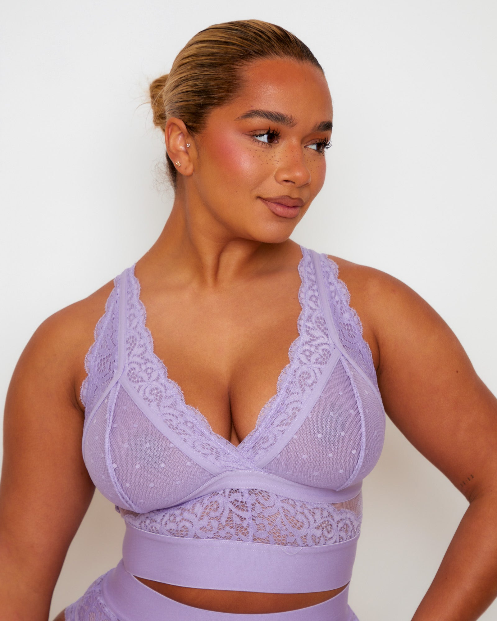 Tutti Rouge Francine Soft Lavender longline bralette, front view showing a plunge neckline, wide lace straps and floral lace beneath the cups.