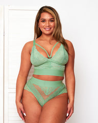 Front view of the Tutti Rouge Gia Basil Green bralette and thong set with a strappy plunge neckline and deep underband.
