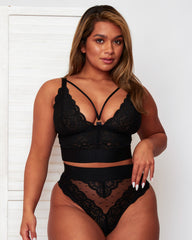 Close-up detail of the Gia Bralette in Black by Tutti Rouge, showcasing intricate floral lace, scalloped edging, decorative front straps, and premium finishing details.