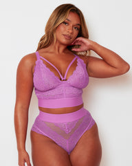 Front view of the Tutti Rouge Gia Pillow Purple lingerie set, featuring a longline lace bralette and matching mesh and lace thong.