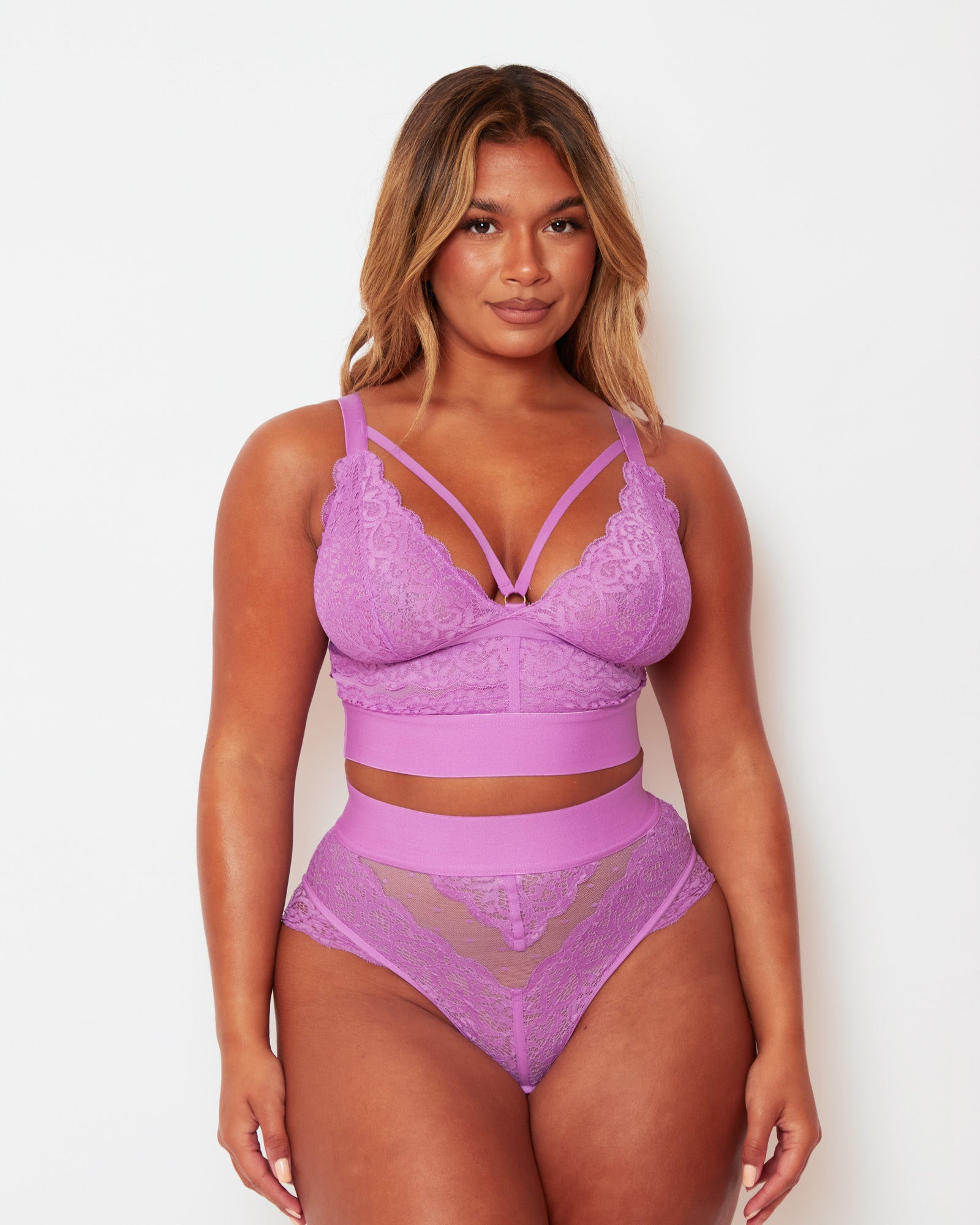 Front view of the Tutti Rouge Gia Pillow Purple bralette and high-waisted thong set with scalloped lace and dotted mesh.