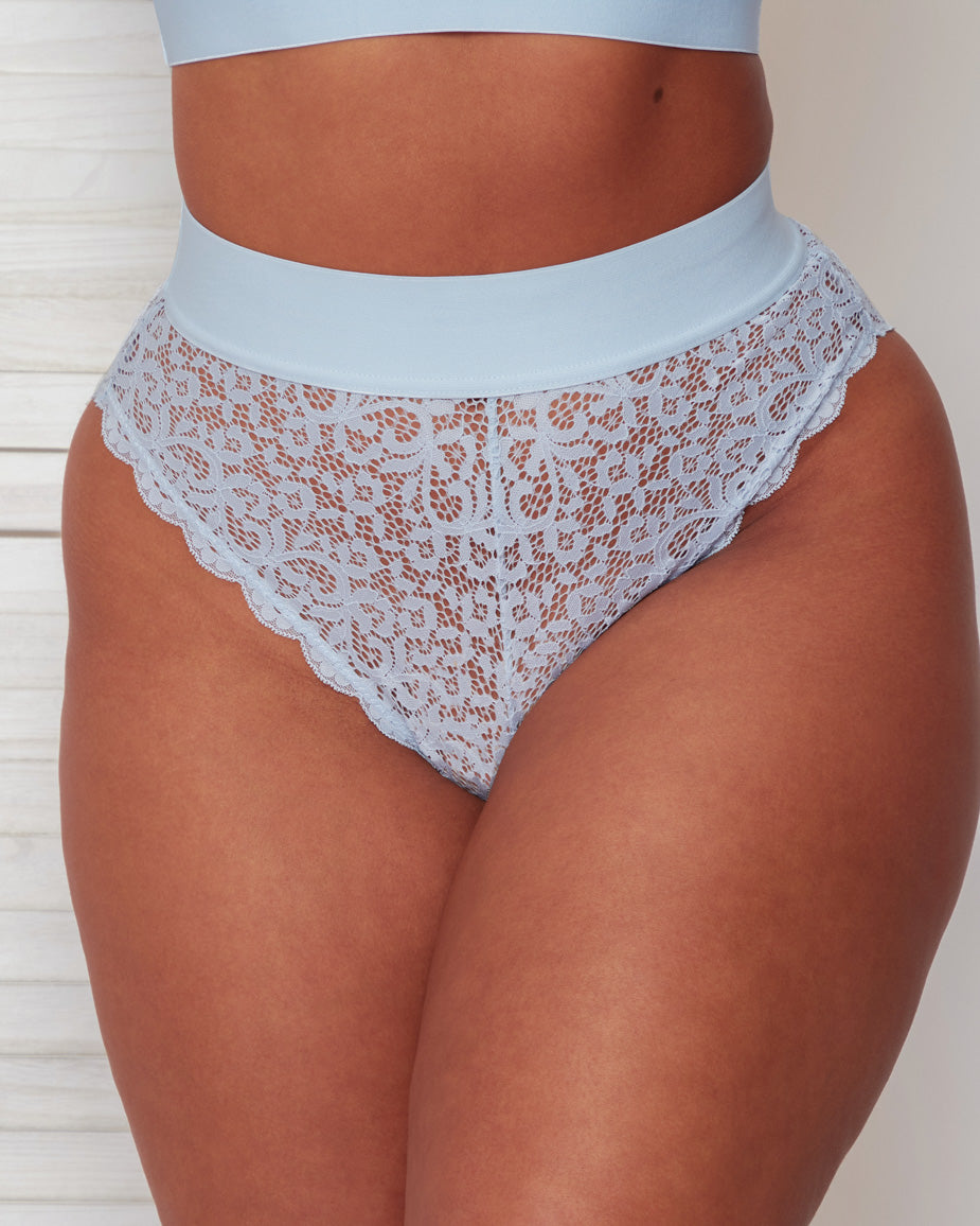 Close-up front view of the Hallie Brief in Ballad Blue, featuring delicate floral lace throughout, a wide soft waistband, and a flattering high-waisted silhouette with scalloped lace edging.