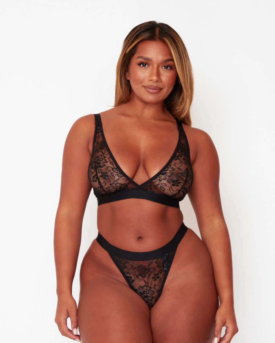 Full-length front view of the Millie-Mae Fullerbust Triangle Bralette and Thong Set in Midnight Black, featuring soft sheer floral lace, a flattering plunge neckline, and a matching no-VPL thong designed for curves.