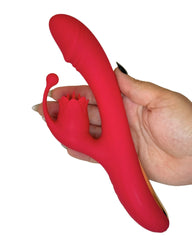 Red silicone tool held by a hand on a white background