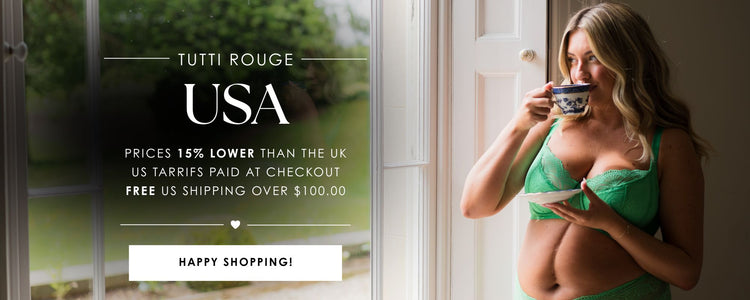 Tutti Rouge USA promotional banner featuring a model wearing green lace lingerie while enjoying a cup of tea by a window, highlighting lower US prices, tariffs paid at checkout and free US shipping over $100.