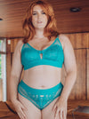 Curve enhancing high waisted brief in a beautiful turquoise blue with cross over cut out detail and no VPL back